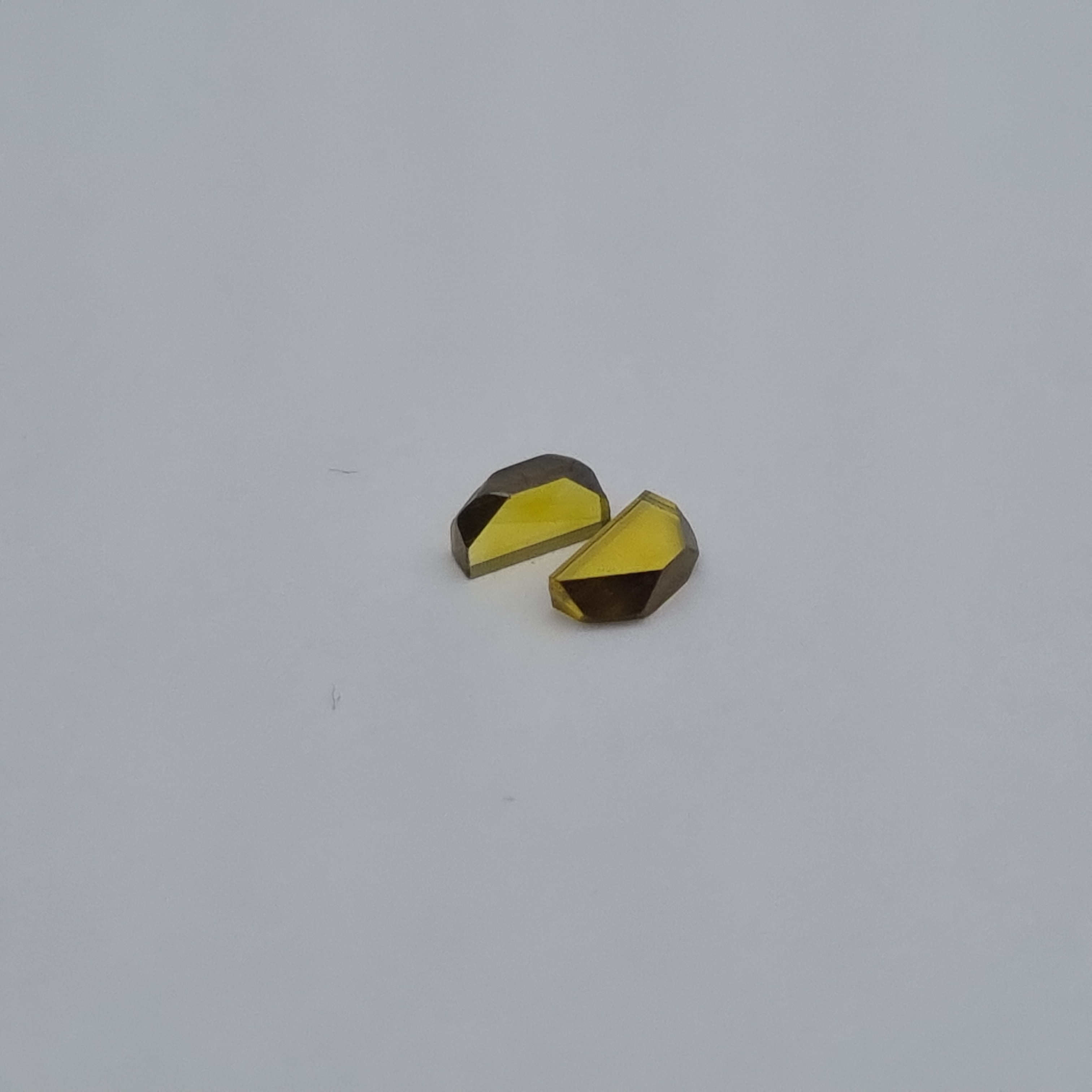 pair of rough synthetic diamond
